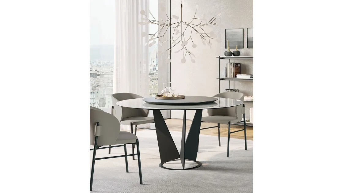 Tavolo rotondo Eiffel in gres con piano girevole in legno di Dall'Agnese